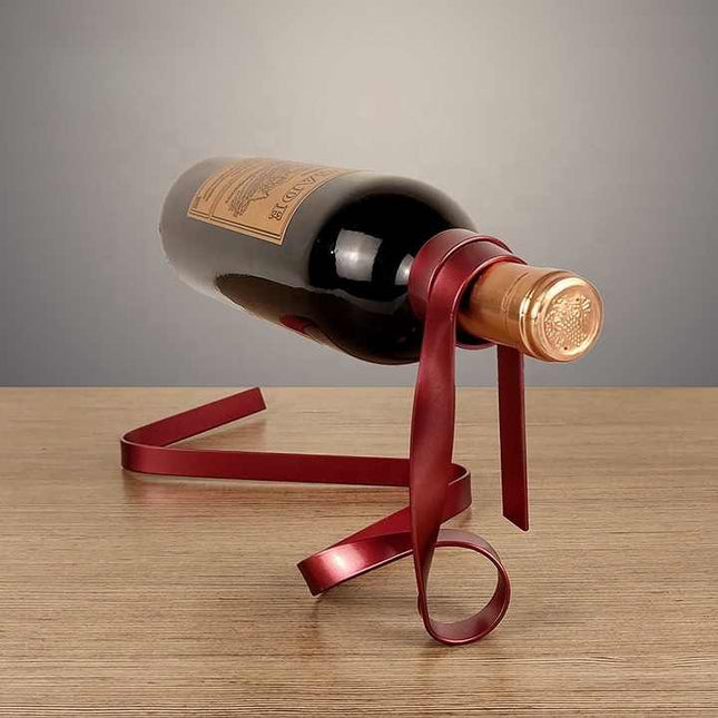 Red Modern Ribbon Wine Bottle Holder - Creative Floating Wine Rack for Home and Bar Décor.