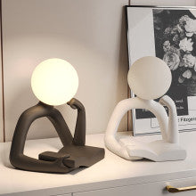 Black Creative Book Reader Desk Lamp - USB Powered, Modern Resin Design.