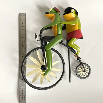 Whimsical Frog Garden Wind Spinner – Metal Yard Art with Cycling Frogs.