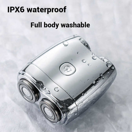 Silver Portable Twin-Head Electric Shaver - Compact Rechargeable Razor for Men.