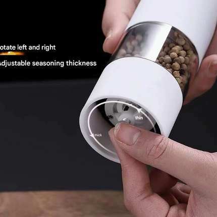 Red Elegant Red Electric Salt and Pepper Grinder - Modern and Compact for Effortless Seasoning.