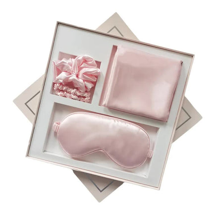 Pink Luxury Faux Silk Sleep Gift Set - 4-Piece Eye Mask, Pillowcase & Scrunchies for Relaxation & Comfort.
