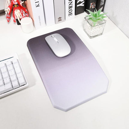 Gradual Pink Ergonomic PU Anti-Slip Mouse Pad with Wrist Support - Rectangular Gradient Desk Mat for Gaming and Office Use.