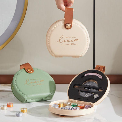 Apricot Portable Sewing Kit with Threads, Needles, and Tools - Compact Travel Case for Sewing Accessories.