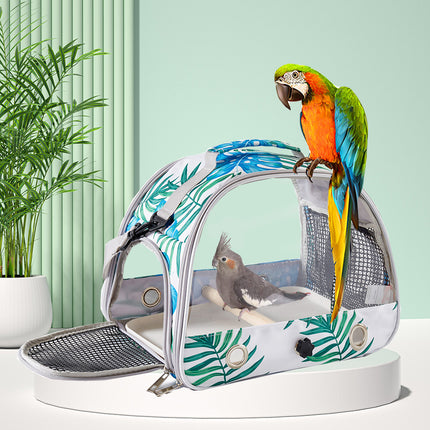 Stylish Leaf Print Clear View Bird Carrier - Portable Travel Cage with Perch & Tray for Parrots, Cockatiels & Small Pets.