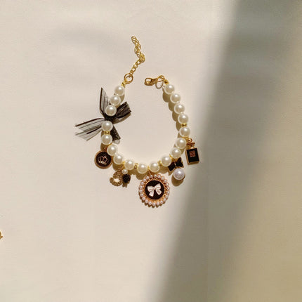 Black 4-PCS Pearl Charm Pet Necklace - Adjustable Bowknot Collar for Small Dogs & Cats (S: 20+5CM).