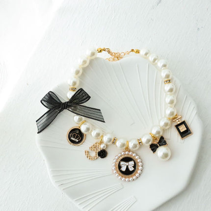 Black 4-PCS Pearl Charm Pet Necklace - Adjustable Bowknot Collar for Small Dogs & Cats (S: 20+5CM).