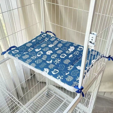 Cat Cage Platform Mat - white cat pattern on Blue background (40x60cm).
