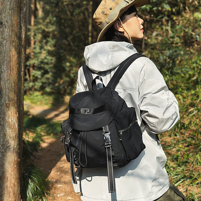 Black Lightweight Nylon Backpack - Water Resistant Travel Daypack for Women & Men.