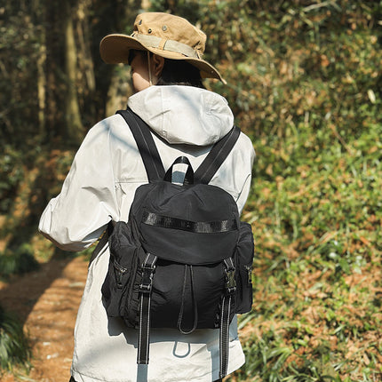 Black Lightweight Nylon Backpack - Water Resistant Travel Daypack for Women & Men.