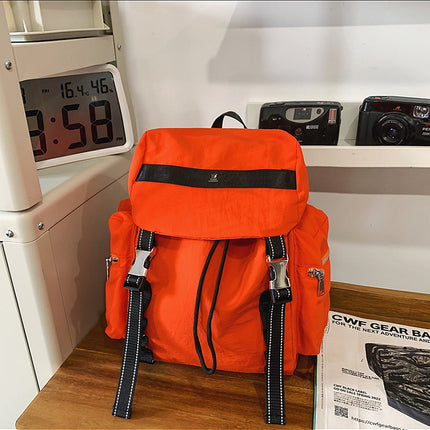 Orange Lightweight Nylon Backpack - Water Resistant Travel Daypack for Women & Men.