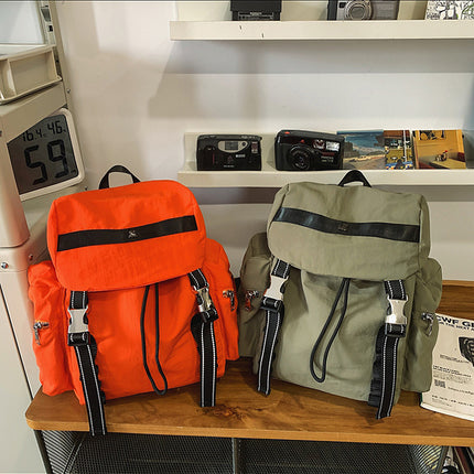 Orange Lightweight Nylon Backpack - Water Resistant Travel Daypack for Women & Men.