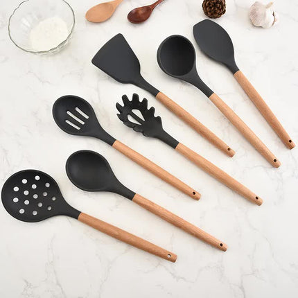 Light Green And Brown 12-Piece Silicone Kitchen Utensil Set - Non-Stick Food-Grade Silicone Cooking Tools with Wooden Handles and Holder.