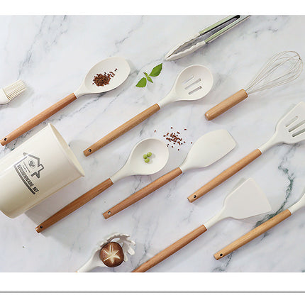 Red 11-Piece Silicone Kitchen Utensil Set with Wooden Handles and Storage Bucket - Heat Resistant and Non-Stick.