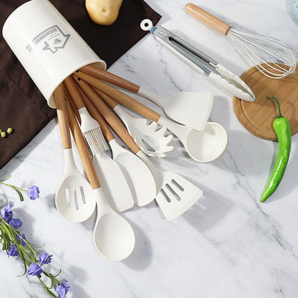 Red 11-Piece Silicone Kitchen Utensil Set with Wooden Handles and Storage Bucket - Heat Resistant and Non-Stick.