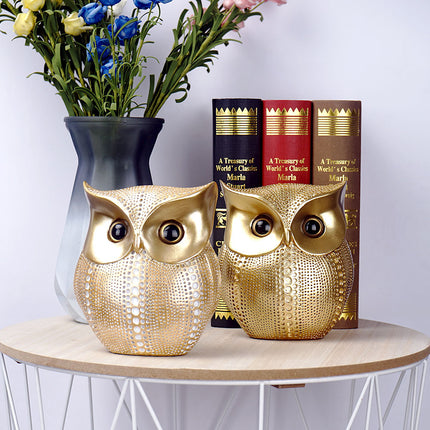 White resin owl statue - modern perforated design for living room TV cabinet and entryway decoration.