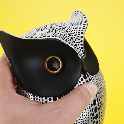 White resin owl statue - modern perforated design for living room TV cabinet and entryway decoration.
