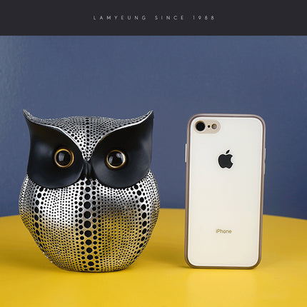 White resin owl statue - modern perforated design for living room TV cabinet and entryway decoration.