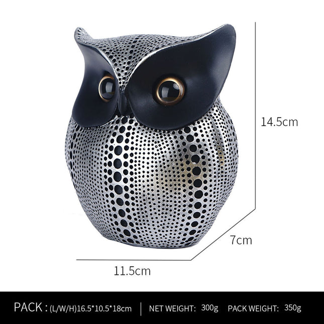 Black silver resin owl statue - modern perforated design for living room TV cabinet and entryway decoration.