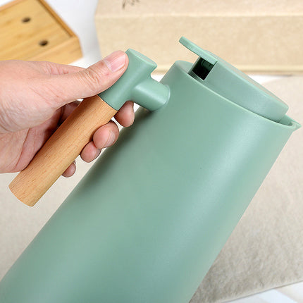 1000ml Bamboo Green thermos bottle with wooden handle, double-layer glass liner coffee pot, suitable for hot and cold drinks.