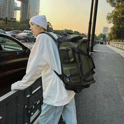 Green Unisex Travel Bag with Utility Buckles and Wet/Dry Compartments.