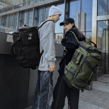 Green Unisex Travel Bag with Utility Buckles and Wet/Dry Compartments.