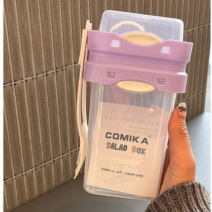 Purple Portable salad cup with ingredient compartment and fork and spoon - enjoy breakfast on the go.