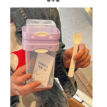 Purple Portable salad cup with ingredient compartment and fork and spoon - enjoy breakfast on the go.