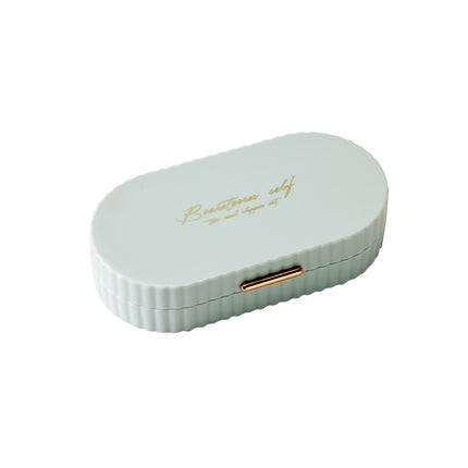 Green Compact 7-Piece Manicure Set - Stainless Steel Nail Grooming Kit with Stylish Travel Case.