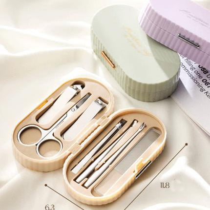 Green Compact 7-Piece Manicure Set - Stainless Steel Nail Grooming Kit with Stylish Travel Case.
