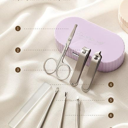 Green Compact 7-Piece Manicure Set - Stainless Steel Nail Grooming Kit with Stylish Travel Case.