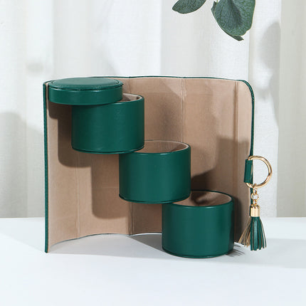 Green Elegant 3-Tier Cylindrical Travel Jewellery Box - PU Leather Organizer for Rings Earrings Necklaces with Tassel Charm.