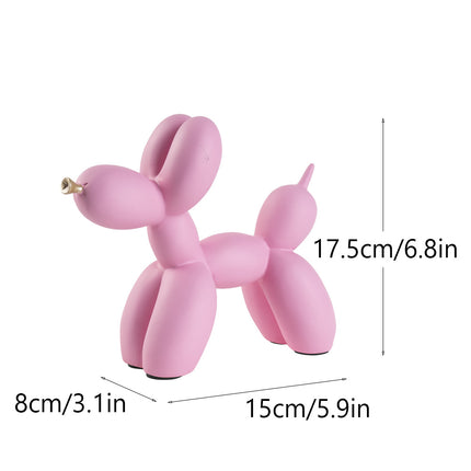 Pink Modern Resin Balloon Dog Sculpture - Playful Art Figurine with Golden Snout Accent.