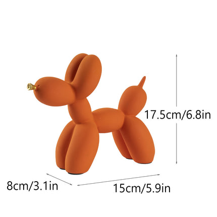 Orange Modern Resin Balloon Dog Sculpture - Playful Art Figurine with Golden Snout Accent.