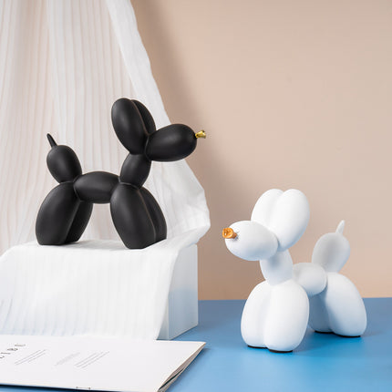 Orange Modern Resin Balloon Dog Sculpture - Playful Art Figurine with Golden Snout Accent.