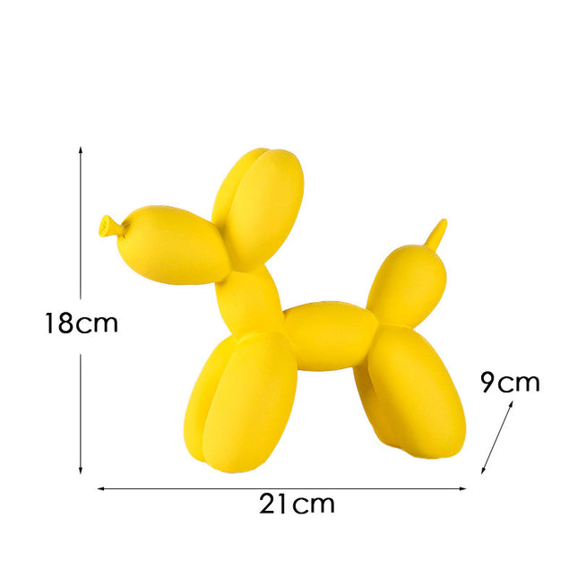 Yellow Modern Resin Balloon Dog Sculpture - Playful Art Figurine with Golden Snout Accent.