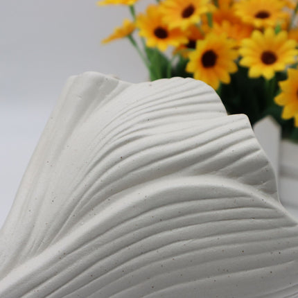 Black Elegant Off-White Ceramic Vase - Modern Sculptural Flower Holder with Wide Fluted Opening.