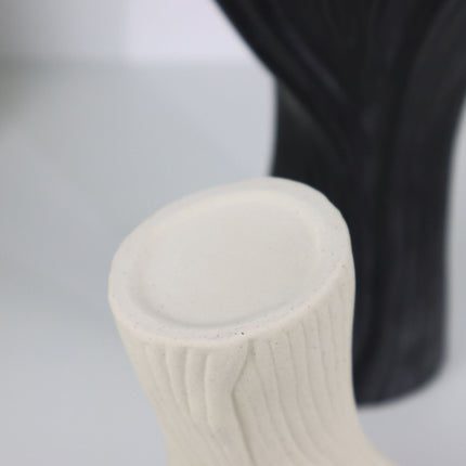 Black Elegant Off-White Ceramic Vase - Modern Sculptural Flower Holder with Wide Fluted Opening.