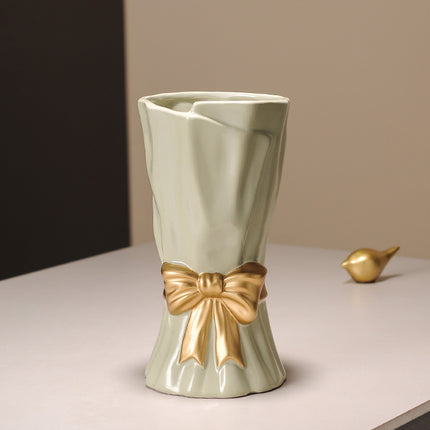 Green Elegant Ceramic Vase with Golden Bow Accent - Textured Relief Flower Holder for Living Room & Dining Table Decor.
