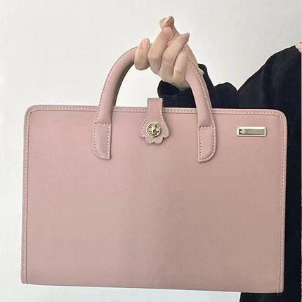 Chic Pink 14-Inch Laptop Handbag - PU Leather Sleeve with Carry Handles & Cooling Vents.