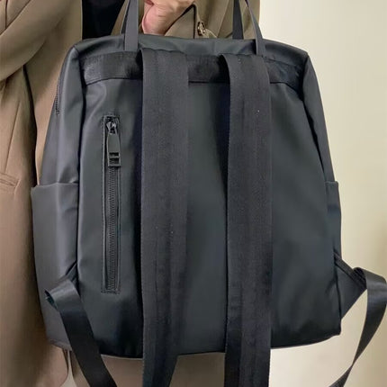 Size S Black Stylish Waterproof Nylon Backpack - Lightweight, Multi-Pocket for Travel, Commute & Daily Use.