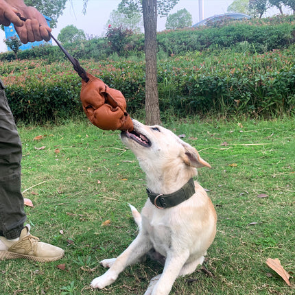 Brown Durable Leather Dog Training Ball with Loop Handle - Interactive Bite & Tug Toy for Playful Pups.