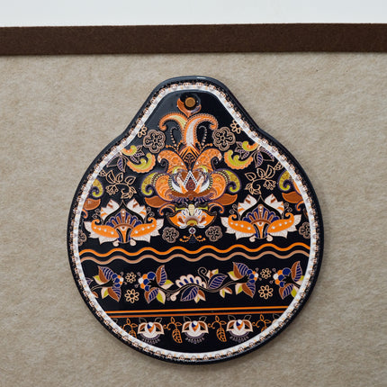 Orange-black Set of 4 Embossed Ceramic Paddle Mats - Assorted Bohemian Pattern Heat Resistant Pads.