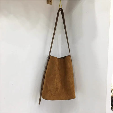 Light Brown Vintage Leopard Suede Bucket Bag for Women with Crossbody Strap.