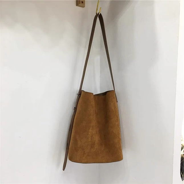 Light Brown Vintage Leopard Suede Bucket Bag for Women with Crossbody Strap.