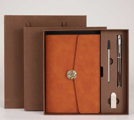 Brown Premium A5 Three-Fold Notebook Gift Set with 16GB USB and Pen.