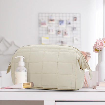 Beige Chic Quilted Puffer Makeup Bag - Large Capacity Travel Cosmetic Organizer with Wide Opening.