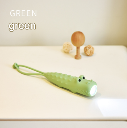 Green Adorable Crocodile Silicone LED Flashlight for Kids - USB Rechargeable, Dimmable Brightness, Portable Night Light.