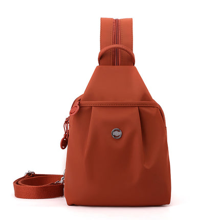 Orange Versatile Women's Convertible Mini Backpack & Sling Bag - Stylish Anti-Theft Oxford Cloth Daypack, Fits 9.7in iPad.