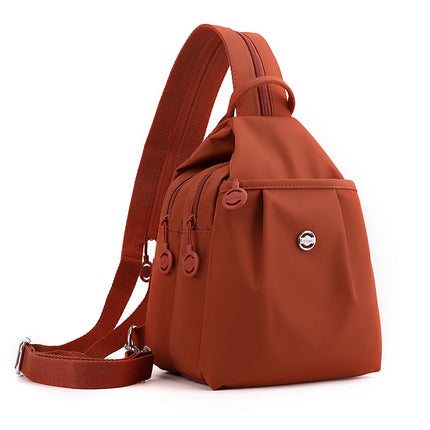 Orange Versatile Women's Convertible Mini Backpack & Sling Bag - Stylish Anti-Theft Oxford Cloth Daypack, Fits 9.7in iPad.